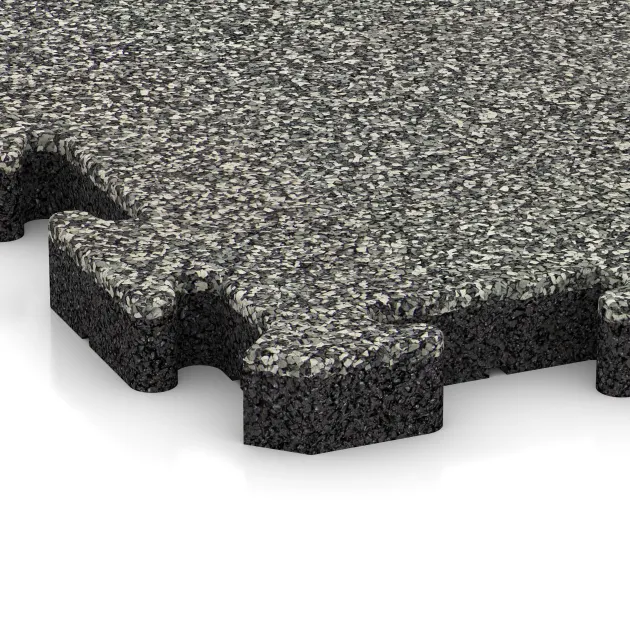 Detailaufnahme der Randausprägung von WARCO-Produkt 2849, Piastra antitrauma ad incastro puzzle, Format 500 x 500 x 40 mm, Farbe Granito classico.