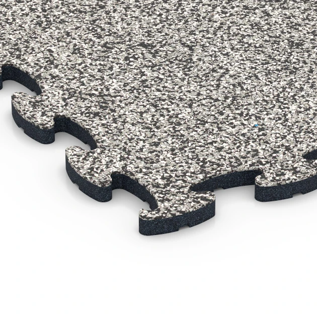 Detailaufnahme der Randausprägung von WARCO-Produkt 6914, Pavimentazione fiere clic, Format 44,6 x 44,6 x 1,8 cm, Farbe Granito grigio.