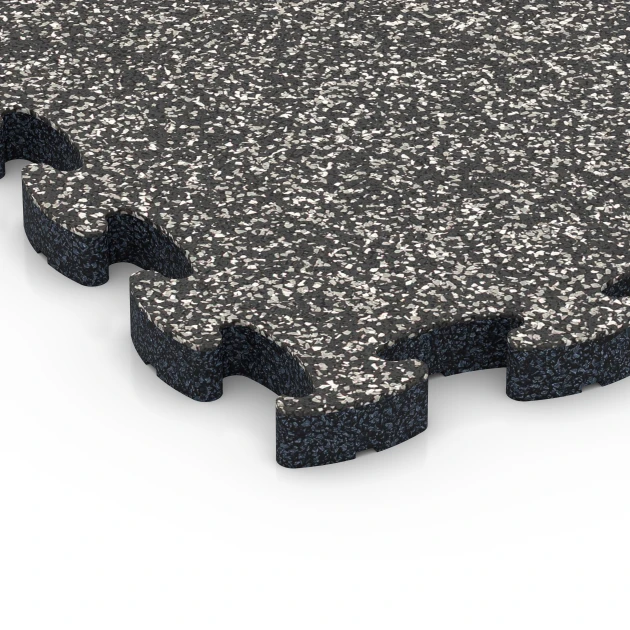 Detailaufnahme der Randausprägung von WARCO-Produkt 6931, Fallschutz Puzzlematte, Format 44,6 x 44,6 × 2,8 cm, Farbe Dunkelgrauer Granit.