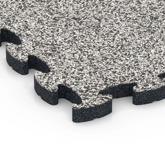 Detailaufnahme der Randausprägung von WARCO-Produkt 6842, Fitness Active pavimento, Format 44,6 x 44,6 × 2,8 cm, Farbe Granito grigio.