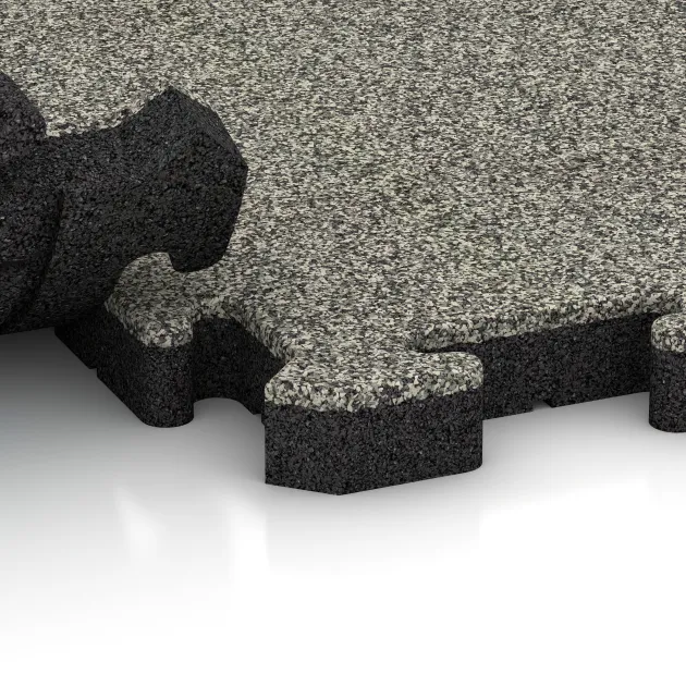 Großaufnahme vom Verbindungssystem von WARCO-Boden 2850 - Fallschutz-Puzzlematte im Farbdesign Heller Granit. Abmessungen 500 x 500 x 40 mm.