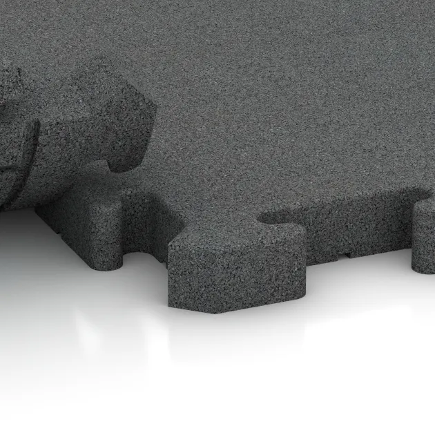 Großaufnahme vom Verbindungssystem von WARCO-Boden 2963 - Piastra antitrauma ad incastro puzzle im Farbdesign Grigio ardesia. Abmessungen 500 x 500 x 40 mm.