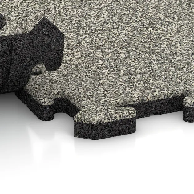 Großaufnahme vom Verbindungssystem von WARCO-Boden 2629 - Piastra antitrauma ad incastro puzzle im Farbdesign Granito chiaro. Abmessungen 500 x 500 x 30 mm.