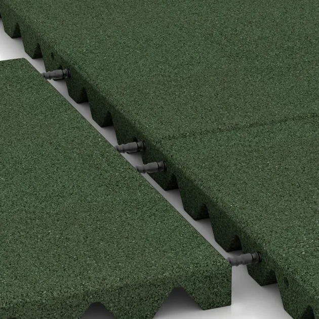 Großaufnahme vom Verbindungssystem von WARCO-Boden 0624 - Piastra antitrauma im Farbdesign Verde erba. Abmessungen 500 x 500 x 40 mm.