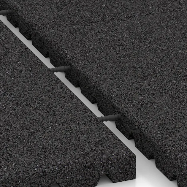 Großaufnahme vom Verbindungssystem von WARCO-Boden 0780 - Fallschutzmatte im Farbdesign Anthrazit. Abmessungen 1000 x 1000 x 40 mm.