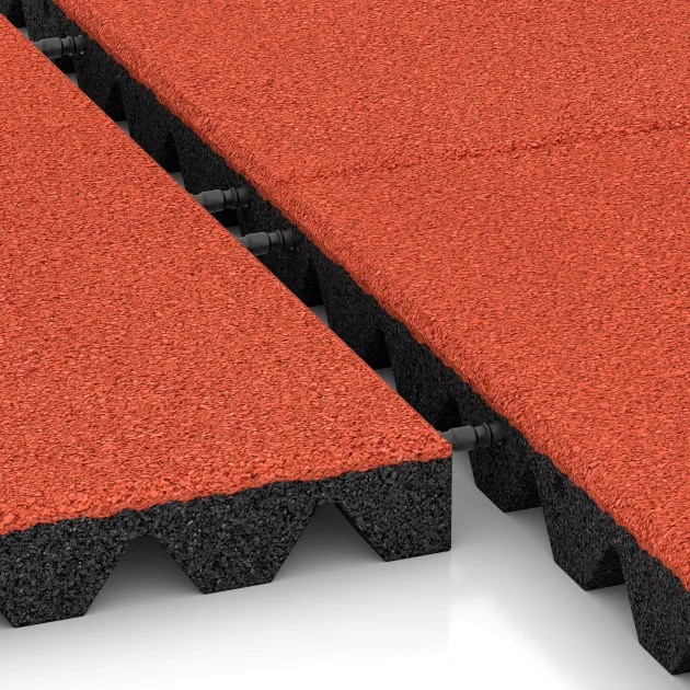 Großaufnahme vom Verbindungssystem von WARCO-Boden 0638 - Fallschutzplatte im Farbdesign Hellrot-Orange. Abmessungen 500 x 500 x 45 mm.