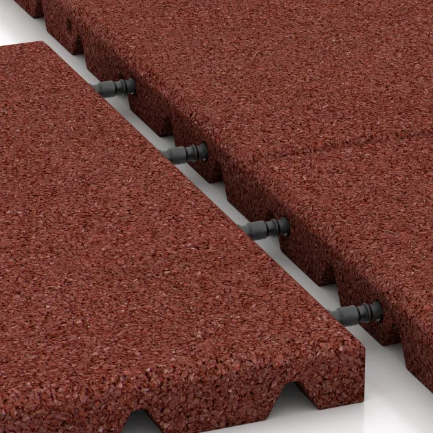 Großaufnahme vom Verbindungssystem von WARCO-Boden 0521 - Piastra antitrauma im Farbdesign Rosso mattone. Abmessungen 400 x 400 x 30 mm.