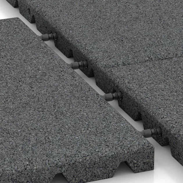 Großaufnahme vom Verbindungssystem von WARCO-Boden 0523 - Piastra antitrauma im Farbdesign Grigio ardesia. Abmessungen 400 x 400 x 30 mm.