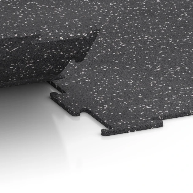 Großaufnahme vom Verbindungssystem von WARCO-Boden 6452 - Pavimento Fitness Compatto im Farbdesign Grigio leggermente punteggiato. Abmessungen 100 × 100 × 0,8 cm.