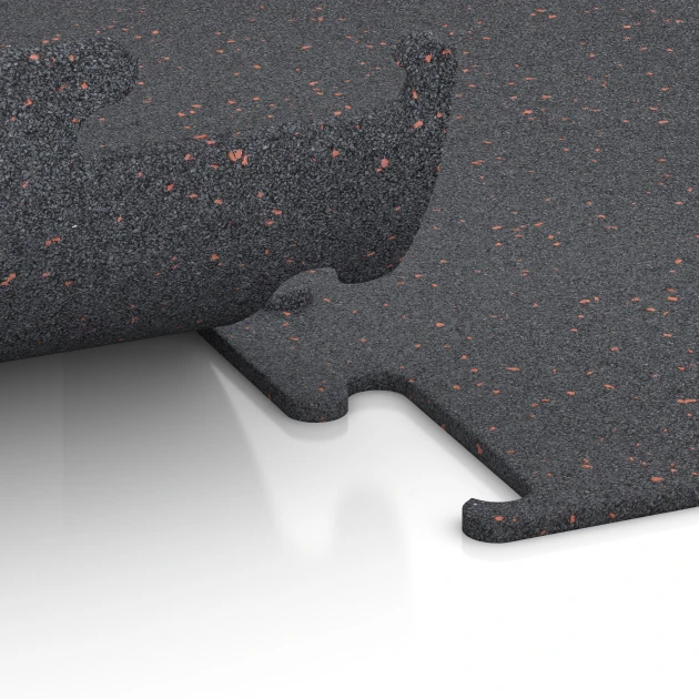 Großaufnahme vom Verbindungssystem von WARCO-Boden 3765 - Pavimentazione Fitness Performance Elite im Farbdesign Rosso leggermente punteggiato. Abmessungen 50 x 50 x 1 cm | 0,25 m².