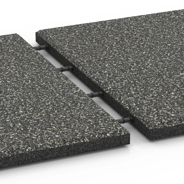 Großaufnahme vom Verbindungssystem von WARCO-Boden 6413 - Piastrella antitrauma – 90 cm im Farbdesign Granito grigio scuro. Abmessungen 50 x 50 x 3 cm | 0,25 m².