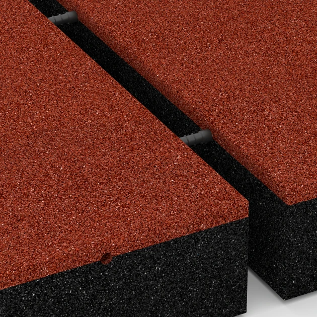 Großaufnahme vom Verbindungssystem von WARCO-Boden 6278 - Piastrella antitrauma – 300 cm im Farbdesign Rosso mattone. Abmessungen 50 x 50 x 11 cm.