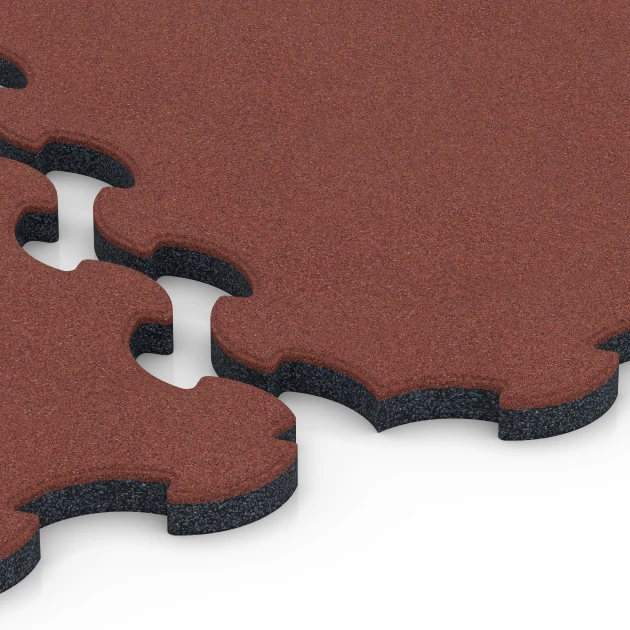 Großaufnahme vom Verbindungssystem von WARCO-Boden 6392 - Stallmatte Puzzle im Farbdesign Rosso mattone. Abmessungen 102,5 x 102,5 x 3 cm | 1,05 m².