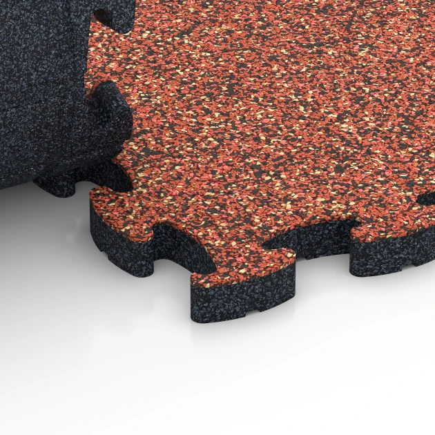 Großaufnahme vom Verbindungssystem von WARCO-Boden 6935 - Pavimentazione antitrauma puzzle im Farbdesign Etna. Abmessungen 44,6 x 44,6 × 2,8 cm.