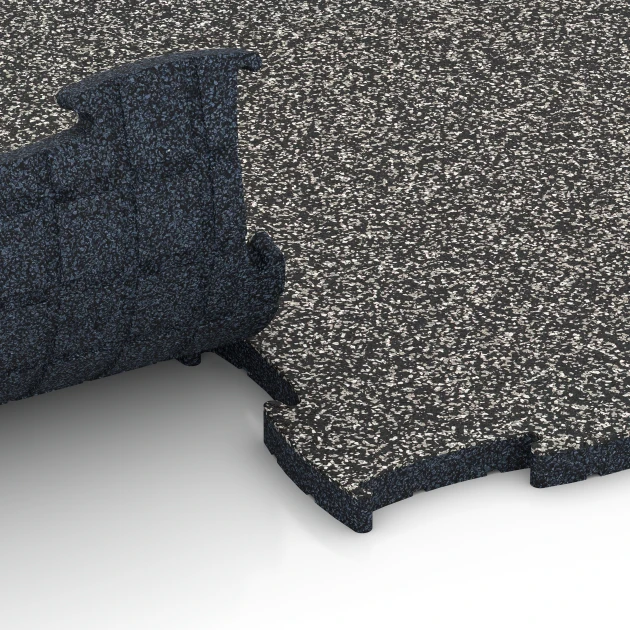 Großaufnahme vom Verbindungssystem von WARCO-Boden 6850 - Fitness Active pavimento im Farbdesign Granito grigio scuro. Abmessungen 97,1 x 97,1 x 2,8 cm.