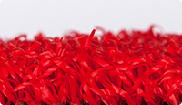 Farbmuster zu WARCO Bodenfliesen mit aufkaschiertem Kunstgras in der Farbe rot.